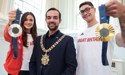 Olympic medallists Rebecca Shorten and Jack McMillan with Lord Mayor of Belfast, Councillor Micky Murray.