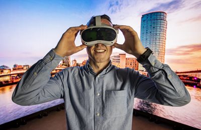Young man using VR headset