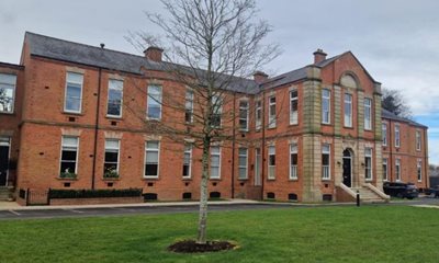 Converted listed pavilion at former Belvoir Park Hospital site