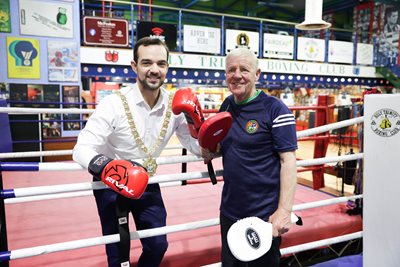 Lord Mayor of Belfast, Councillor Micky Murray with Holy Trinity Boxing club trainer Mickey Hawkins